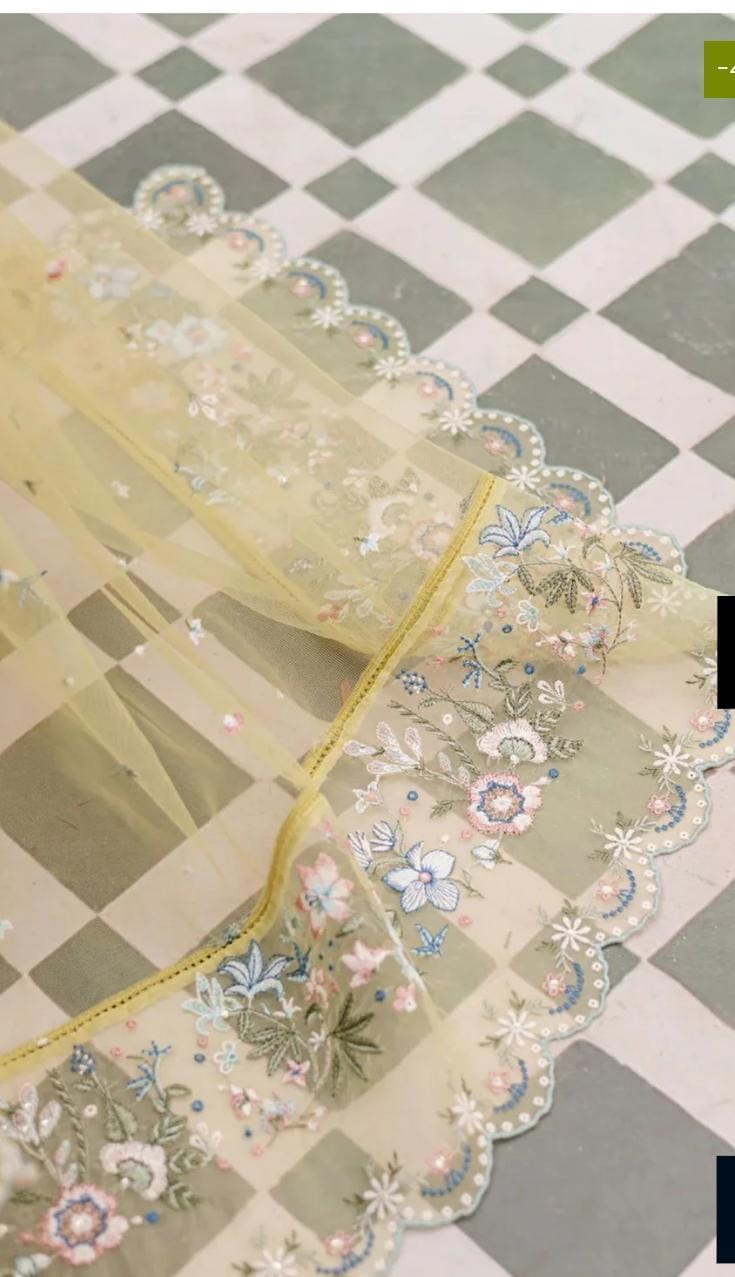 Embroidered fabric with floral patterns on a checkered background