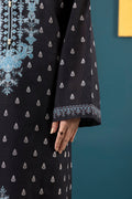 Black dress with white floral patterns against a teal background