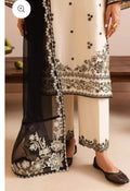 Black and white embroidered traditional outfit with sheer overlay