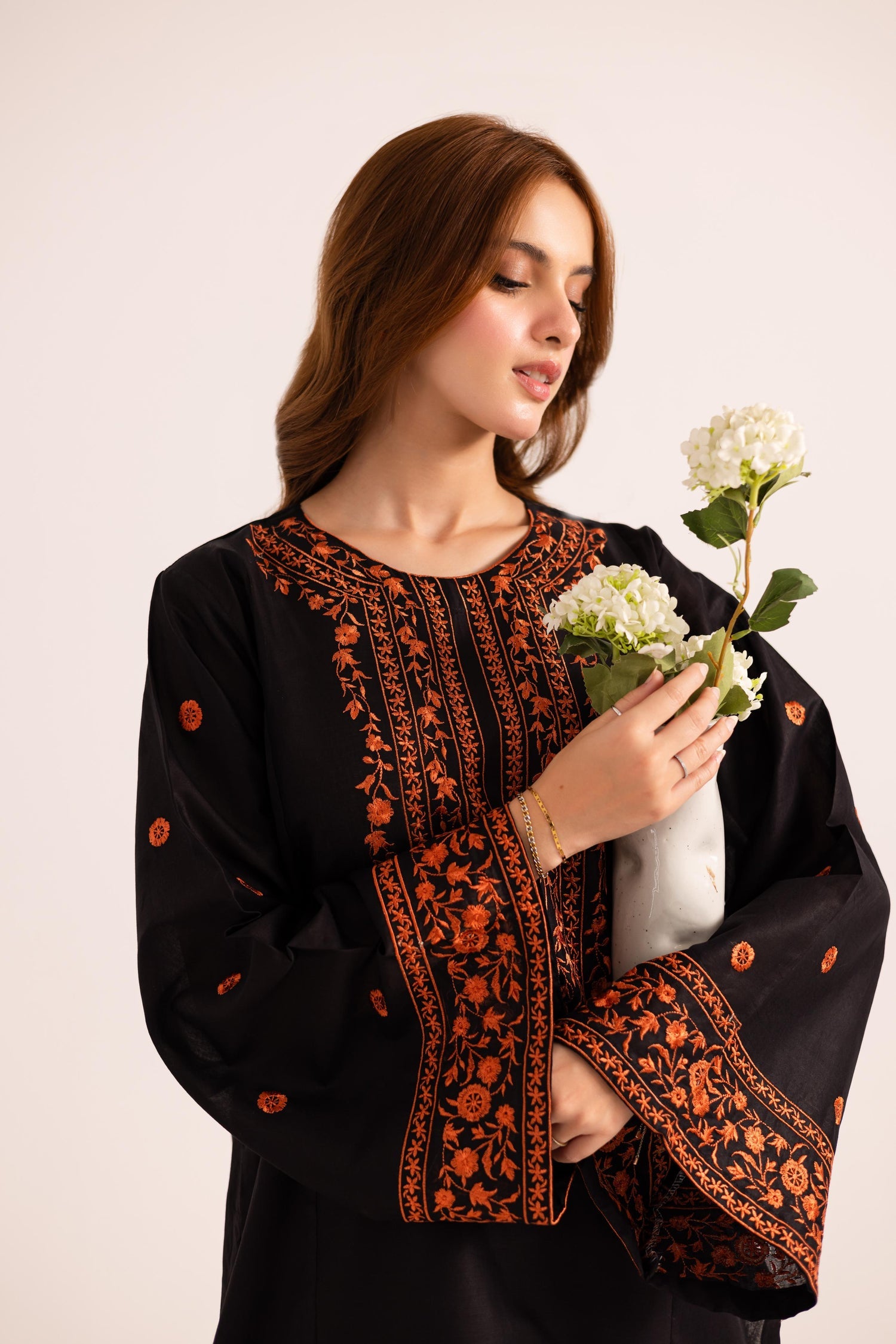 Straight cut black kurta with embroidery and plazzo trousers by Haraj Collections